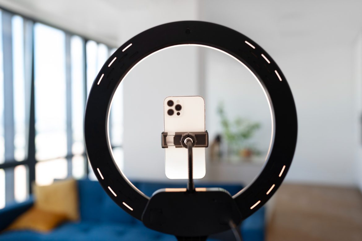 recording-video-with-smartphone-ring-light Real Estate